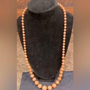 Beaded orange toned necklace